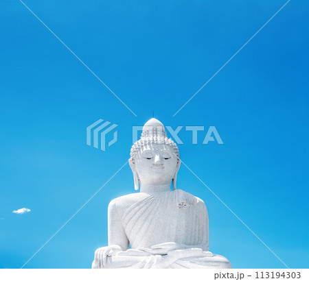 Big Buddha white marble statue by blue sky in Phuket, Thailand Big Buddha white marble statue by blue sky in Phuket, Thailand 113194303