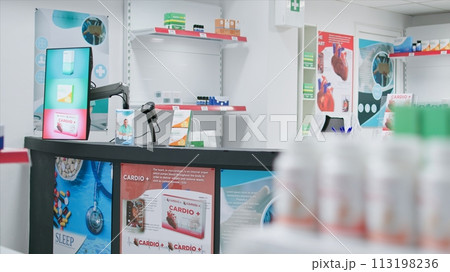Empty health center with medicine bottles and packages, drugstore shelves loaded with pharmaceuticals. Pharmacy providing prescribed drugs, nutritional supplements and treatment options. 113198236