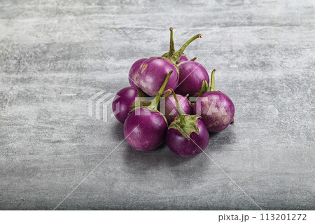 Raw small purple asian baby eggplant 113201272