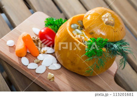 Recipe of squash soup in baked pumpkin 113201681