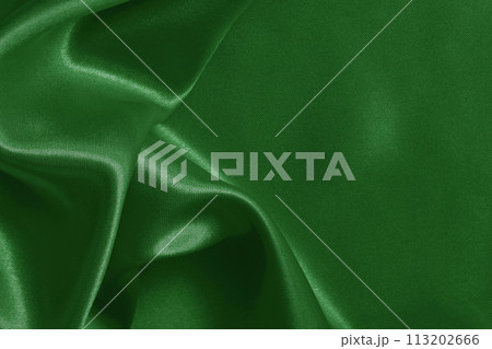 Dark green fabric cloth texture for background and design art work, beautiful crumpled pattern of silk or linen. 113202666