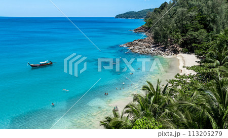 Aerial view banana beach white tropical beach with long-tail boat  and palm tree in banana beach, Tropical beach with clear water at Banana beach, Phuket, Thailand. 113205279