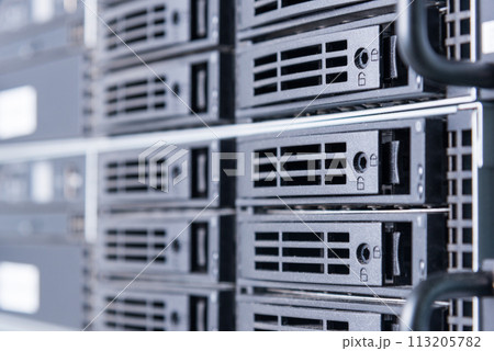 Row of hard disks used for data storage in internet data center 113205782