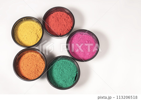Top view of colorful traditional holi powder in bowl isolated on white background. Top view of colorful traditional holi powder in bowl isolated on white background. 113206518