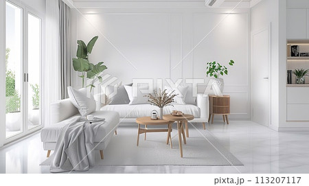Living room with comfortable tone furniture, white back wall with natural light on the side from the window. 113207117