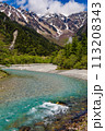 River Azusa flowing through the Kamikochi valley with snowy peaks (Kamikochi, Japan) 113208343