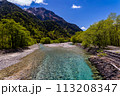 Clear, cold river running through a forested valley. River Azusa, Kamikochi, Japan 113208347