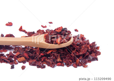 Dried bell pepper or paprica red spice in spoon isolated on the white 113209490