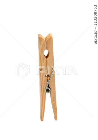 wooden clothes pegs isolated on the white 113209753