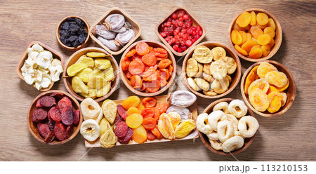 bowls of various dried fruits, top view 113210153
