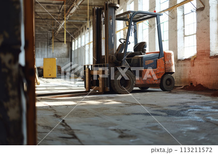 Forklift working in warehouse 113211572