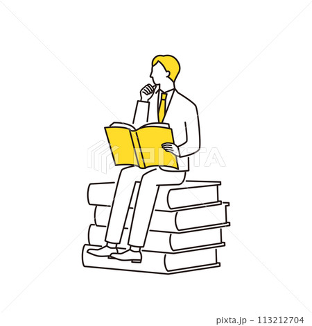 本に座って読書をするビジネスマン 113212704