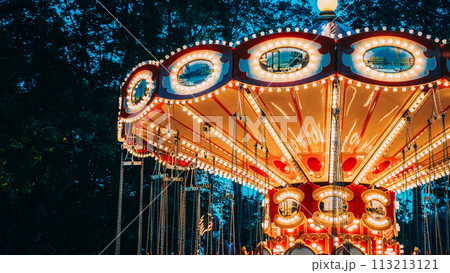 Carousel Merry-Go-Round. Summer Evening In City Amusement Park. Carousel Merry-Go-Round. Summer Evening In City Amusement Park. 113213121