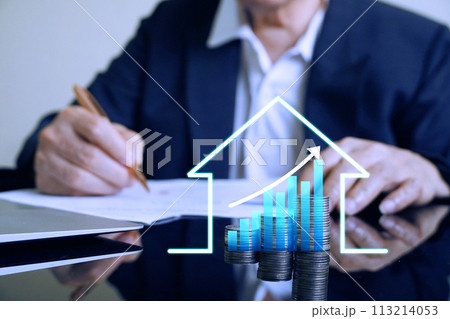 Icon Housing and diagram up trand on stacks of money on the table with blur background man sign real estate contact,  113214053