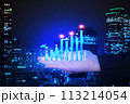 Chart business show up trend data on businessman 's hand with blur background night city , business finance concept. 113214054