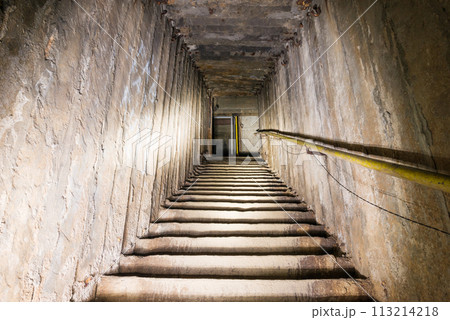 Dark underground staircase Dark underground staircase 113214218