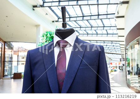 Male mannequin dressed in elegant suit with a tie Male mannequin dressed in elegant suit with a tie 113216219