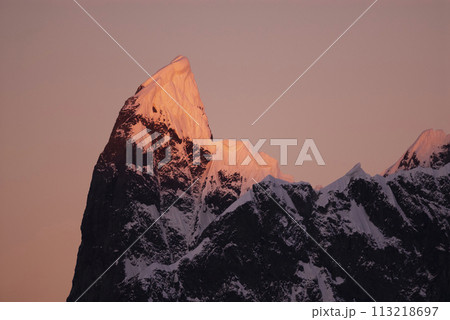 Lemaire strait coastal landscape, mountains and icebergs, Antarctic Peninsula, Antartica. 113218697