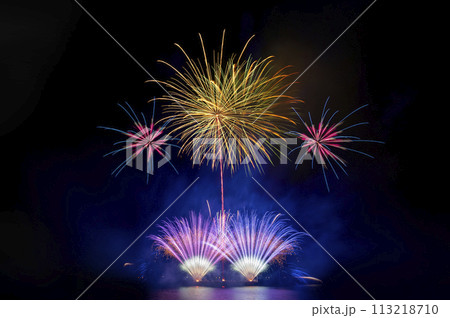 colourful firework display set for celebration happy new year and merry christmas and  fireworks on black background 113218710