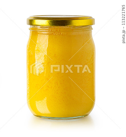 melted butter in a glass jar 113221765