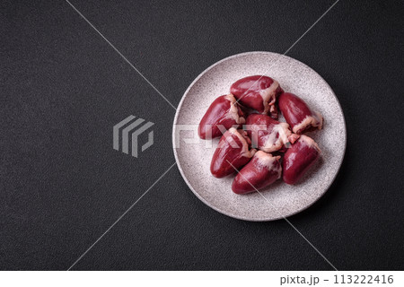 Raw turkey or chicken hearts with salt and spices Raw turkey or chicken hearts with salt and spices 113222416