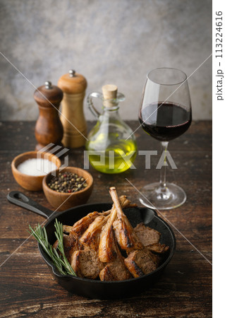 grilled lamb chop on cast iron pan grilled lamb chop on cast iron pan 113224616