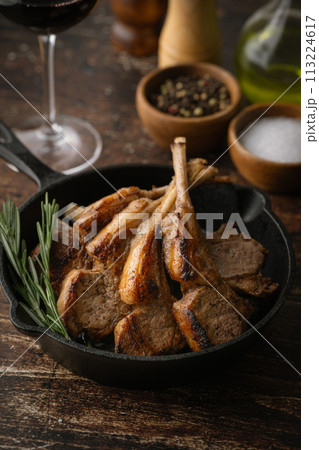 grilled lamb chop on cast iron pan grilled lamb chop on cast iron pan 113224617