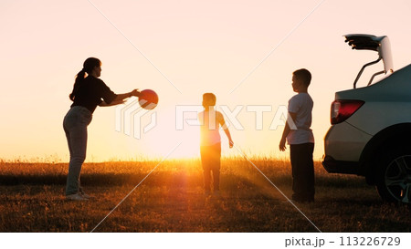 car child ball game, trunk car happy family, car happy father mother child, kid daughter son game ball, travel vacation walks, happy family dream trip, dream family, silhouette family, sunset mother 113226729