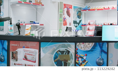 Pharmacy equipped with medicaments packs and bottles, selling dietary supplements and other medicaments. Retail shop with pharmaceutical products and antibiotics on prescription, drugs bottles. Pharmacy equipped with medicaments packs and bottles, selling dietary supplements and other medicaments. Retail shop with pharmaceutical products and antibiotics on prescription, drugs bottles. 113229282