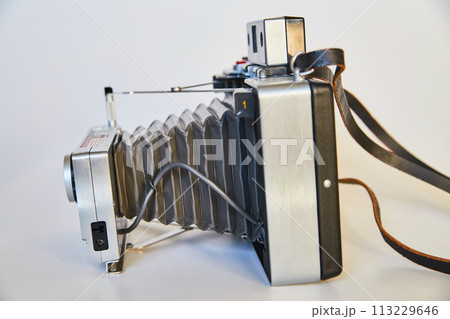 Vintage Bellows Camera Profile on White Background 113229646
