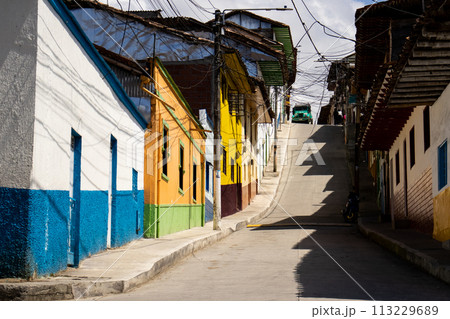 Beautiful street of the heritage town of Salamina located at the Caldas department in Colombia. Traditional yipao. Beautiful street of the heritage town of Salamina located at the Caldas department in Colombia. Traditional yipao. 113229689