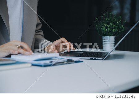 .Business Documents, Auditor businesswoman checking searching document legal prepare paperwork or report for analysis TAX time,accountant Documents data contract partner deal in workplace office 113233545