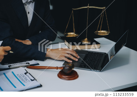 Businessman and Male lawyer or judge consult having team meeting with client, Law and Legal services concept. Businessman and Male lawyer or judge consult having team meeting with client, Law and Legal services concept. 113233559