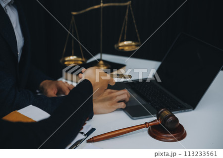 Businessman and Male lawyer or judge consult having team meeting with client, Law and Legal services concept. Businessman and Male lawyer or judge consult having team meeting with client, Law and Legal services concept. 113233561