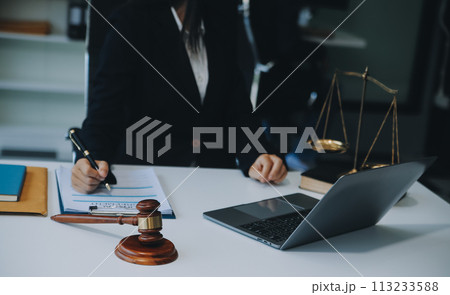 Businessman and Male lawyer or judge consult having team meeting with client, Law and Legal services concept. Businessman and Male lawyer or judge consult having team meeting with client, Law and Legal services concept. 113233588