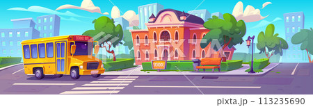 Yellow bus near school building 113235690