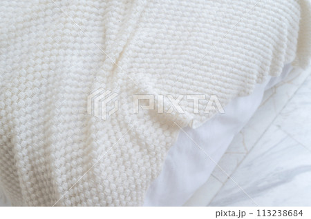 closeup white bed sheet with weave texture closeup white bed sheet with weave texture 113238684