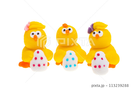 Easter decor sugar chickens isolated 113239288