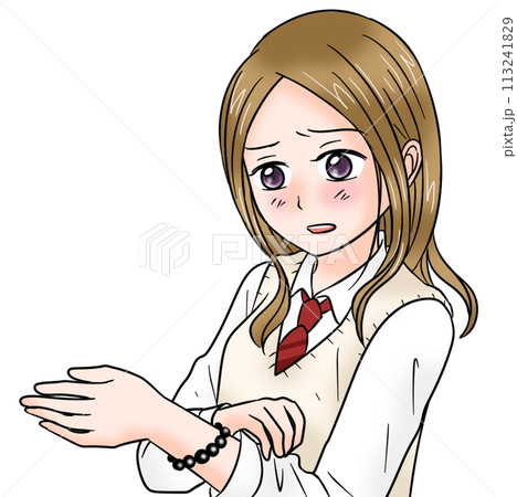 深刻な表情で手首(ブレスレット)を見せる女子高生 113241829