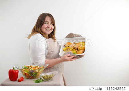 female chicken noodle seller in apron smiling with thumbs up standing in front of cart Roast Chicken 113242265