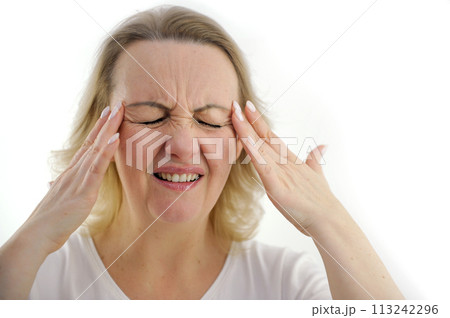 severe headache migraine woman holding hands at temple eyes closed wrinkle forehead mouth ajar in meat disease cold coronavirus consequences white background medicine cure recovery severe headache migraine woman holding hands at temple eyes closed wrinkle forehead mouth ajar in meat disease cold coronavirus consequences white background medicine cure recovery 113242296