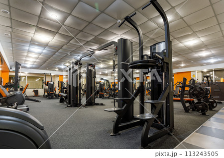 Exercise equipment in an empty gym 113243505