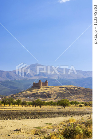 La Calahorra castle with Sierra Nevada, Andalusia, Spain 113245863