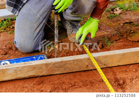 Production of concrete foundation formwork using removable timbers 113252588