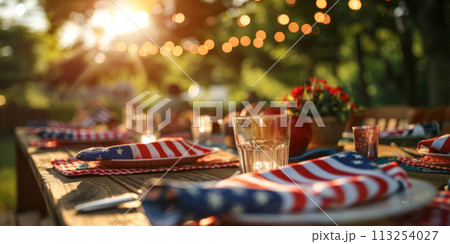 Outdoor dining table set for a patriotic American event. Outdoor dining table set for a patriotic American event. 113254027