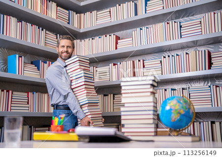 back to school. teachers day. education in school. knowledge day. Dive into a book. knowledge from book. man get university education. school education with man teacher. education and knowledge 113256149