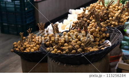 Piles of exotic tropical lychee fruits at grocery store in Thailand. Healthy food concept 113256284