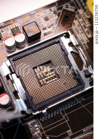 Microprocessor and socket on the motherboard. Computer radio components. Microchips and chips. 113256798