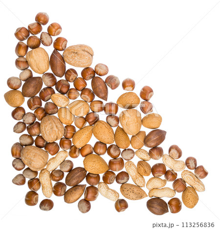 Various nuts arrenged in a pile with copy space, banner or header shape 113256836