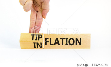 Inflation or tipflation symbol. Concept words Inflation Tipflation on beautiful wooden blocks. Beautiful white background. Businessman hand. Business inflation Tipflation concept. Copy space 113258030